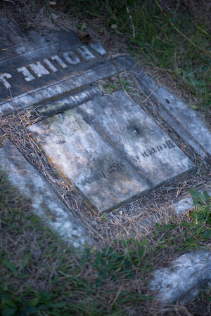 Grounded gravestone